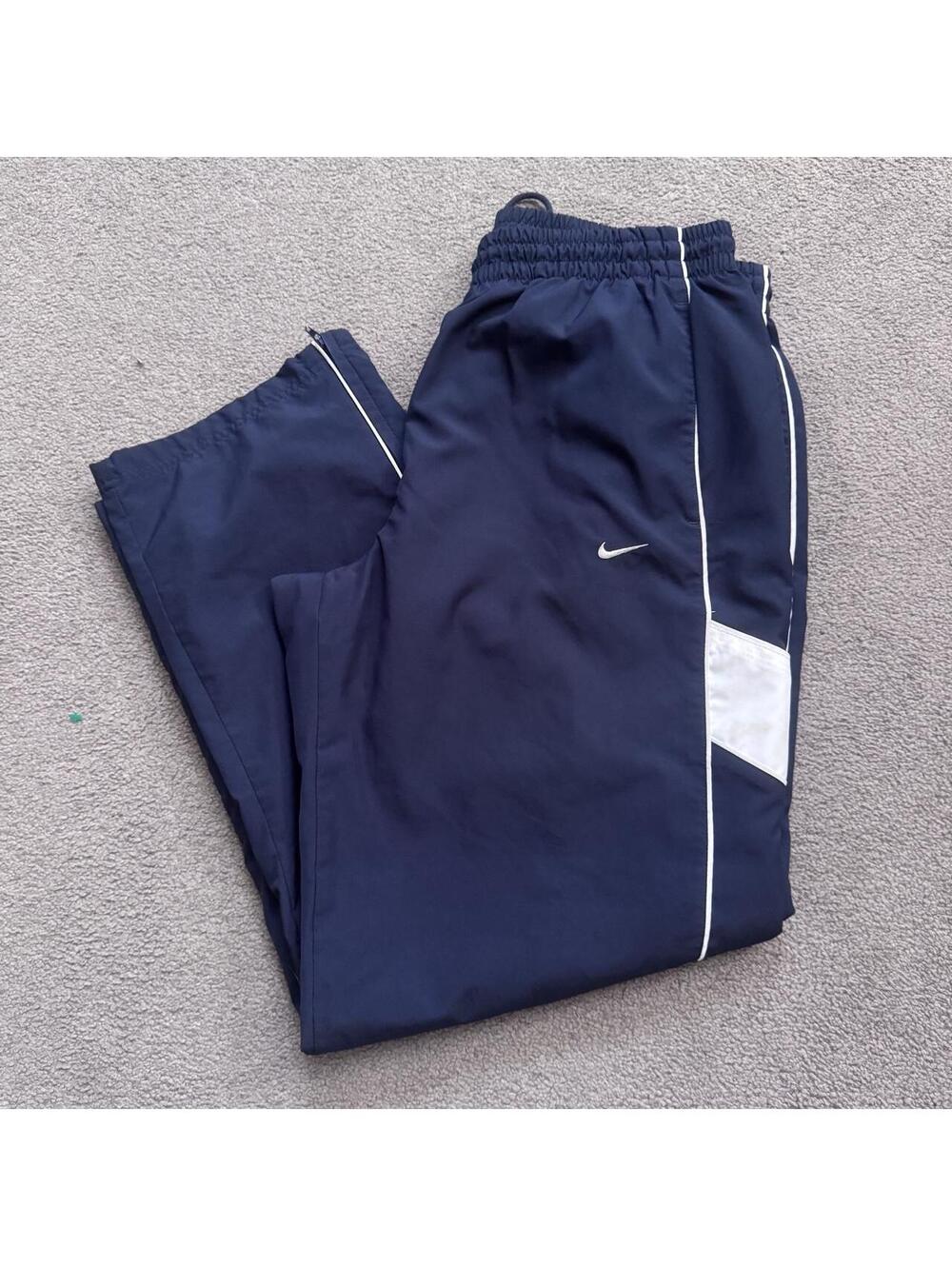 Vintage Y2K Navy Blue Nike Swoosh Track pants the white side stripe and pocket